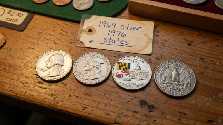 A 1964 Washington quarter, a 1976 Bicentennial quarter, and a state quarter